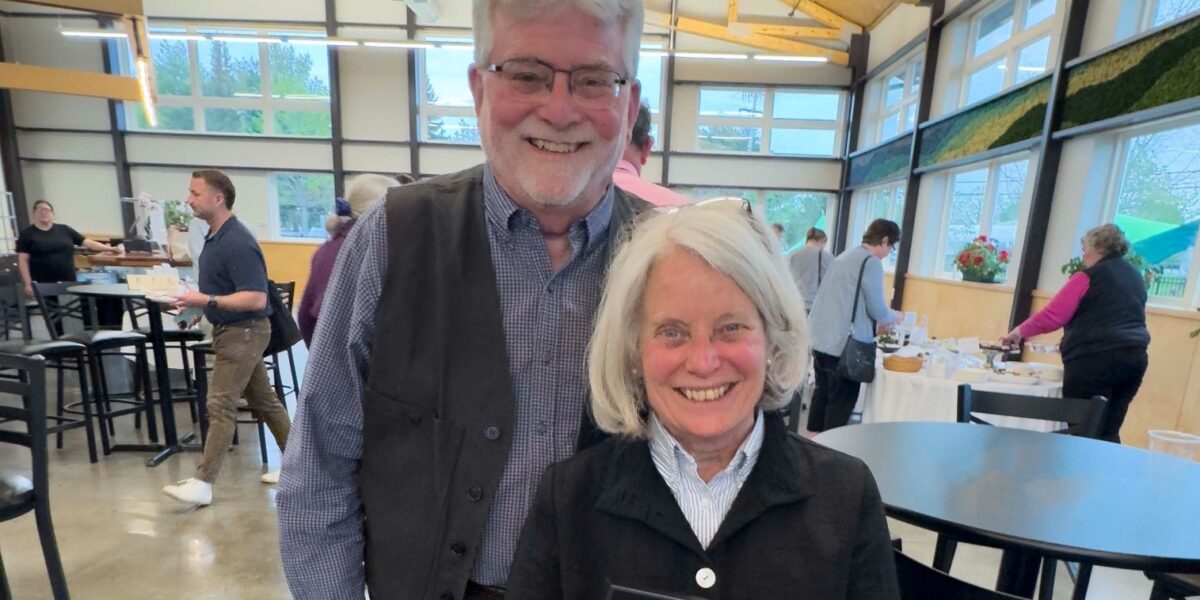 photo of Gene and Nancy with community award