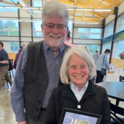 photo of Gene and Nancy with community award